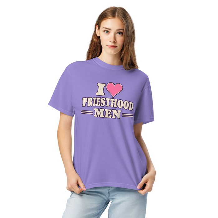 Woman wearing a violet tee that reads I heart Priesthood Men
